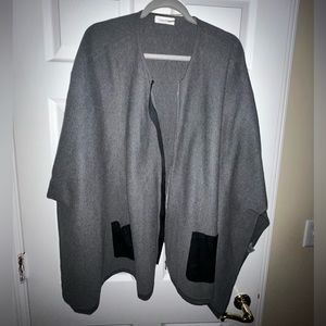 Calvin Klein zip up poncho with faux leather details